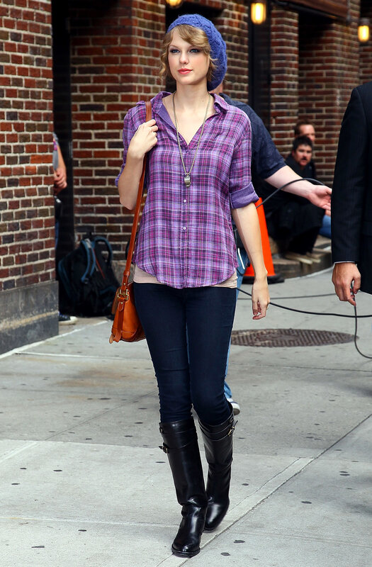 woman in plaid shirt walking