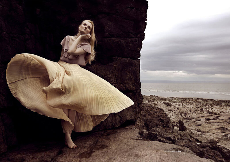 Woman in Pleated Skirt — Beige