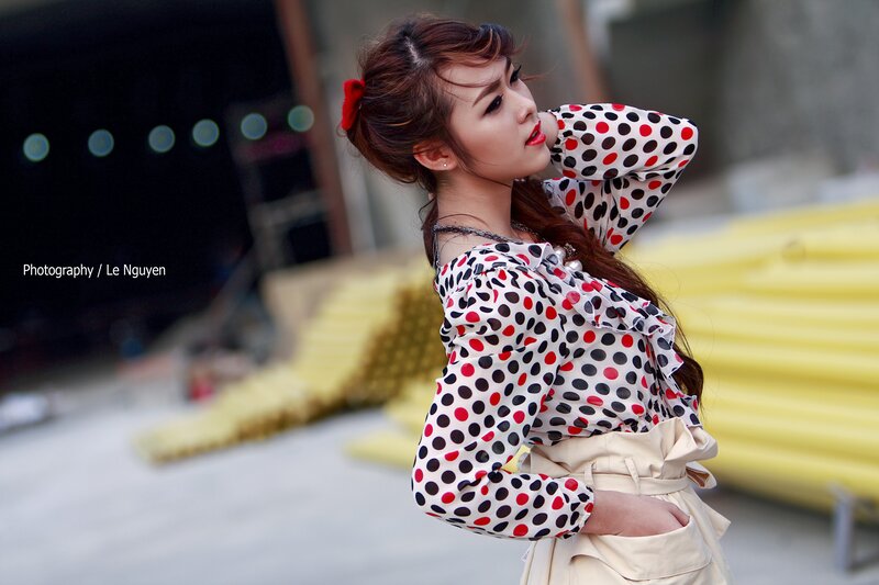 woman in polka dot blouse
