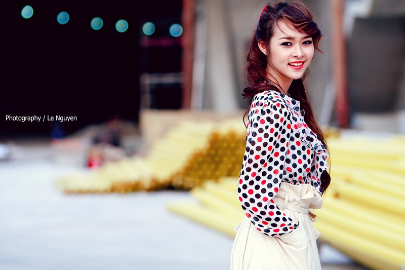 woman in polka dot blouse