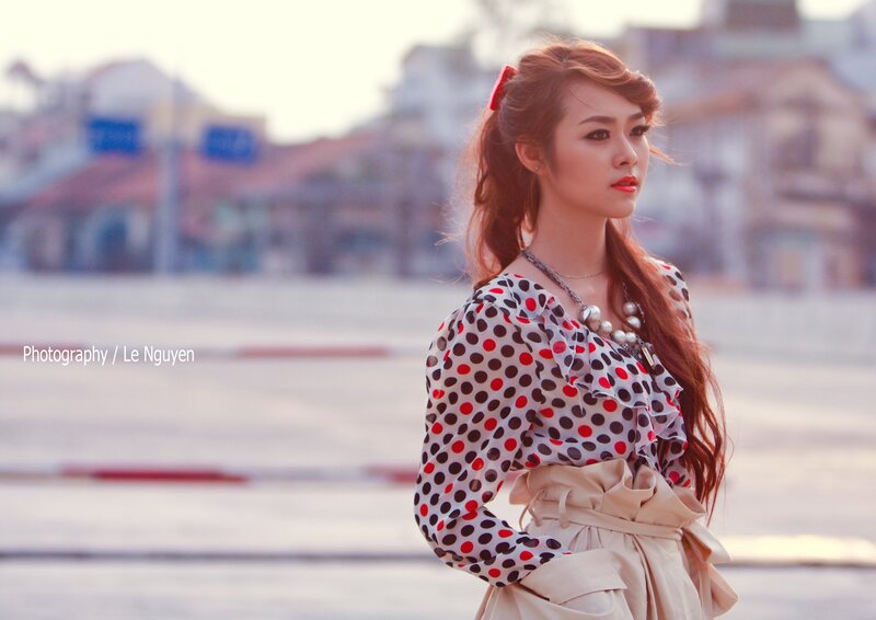 woman in polka dot blouse
