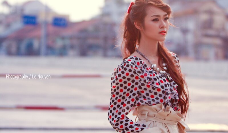 woman in polka dot blouse