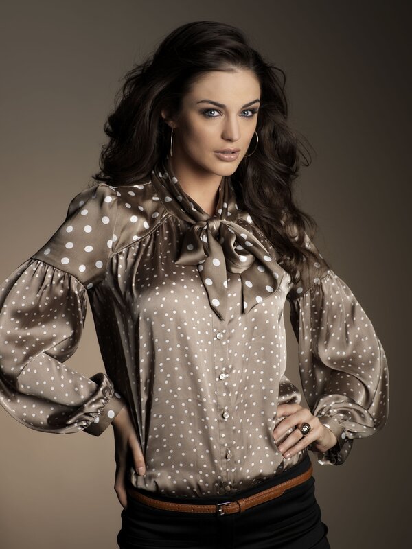 woman in polka dot blouse