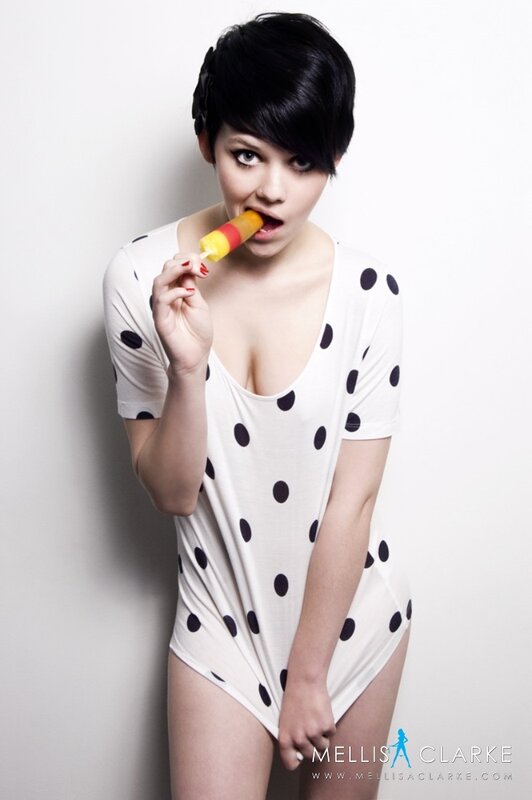 woman in polka dot bodysuit