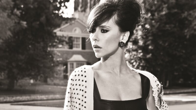 woman in polka dot cardigan