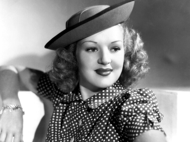 woman in polka dot dress