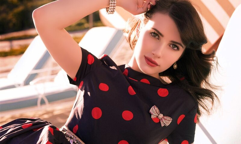 woman in polka dot dress