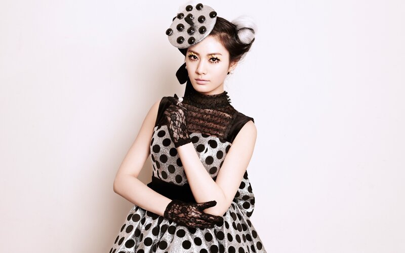 Woman in Polka-dot Dress — Black, Dramatic, Photograph, Hat