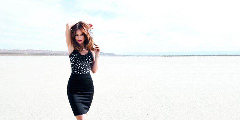 Woman in polka dot dress on salt flat