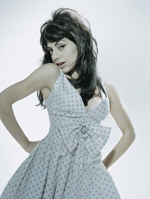 Woman in Polka-dot Dress — White, Confident, Photograph, Hair, Studio