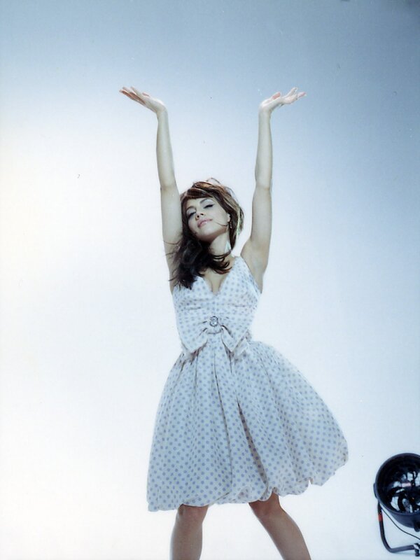 Woman in Polka-dot Dress — White, Playful, Photograph, Studio Light