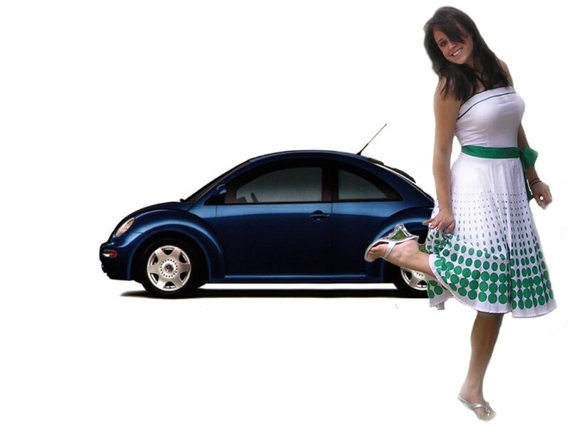 woman in polka dot dress with car