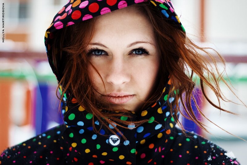 woman in polka-dot jacket