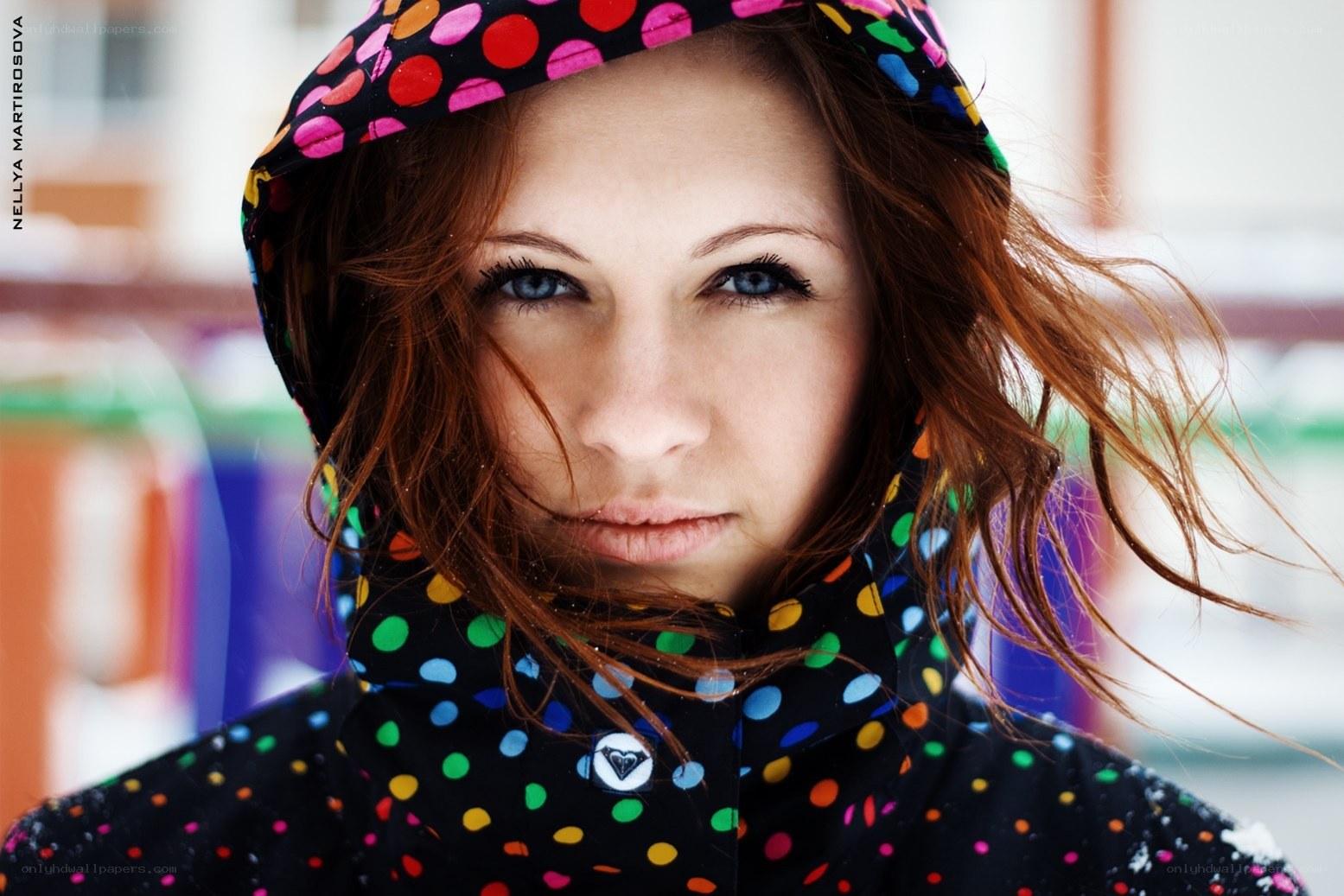 woman in polka-dot jacket