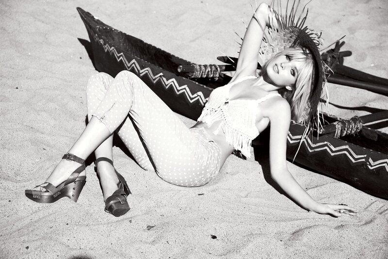 woman in polka-dot pants on beach