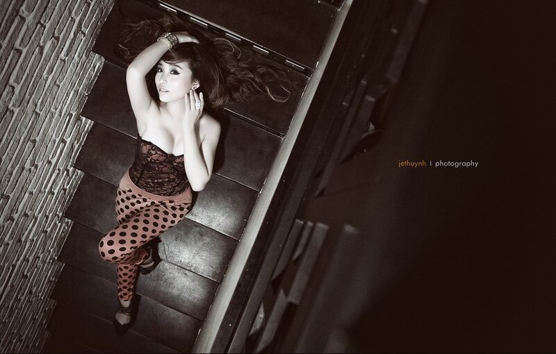 woman in polka dot pants on stairs
