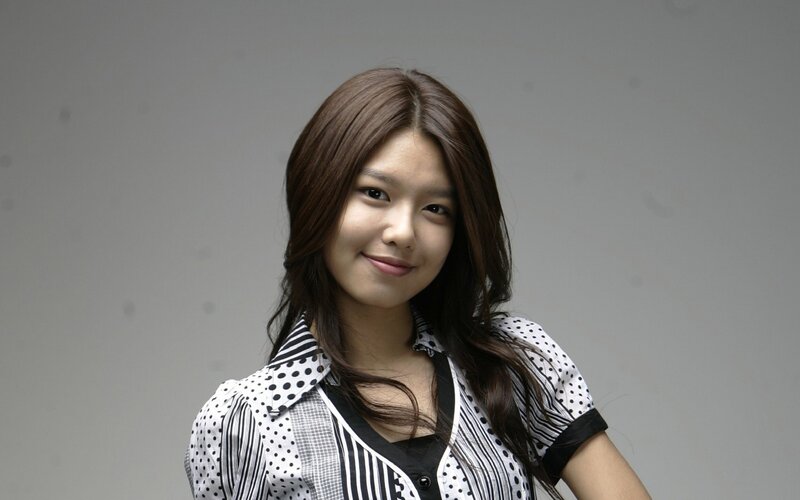 woman in polka dot shirt