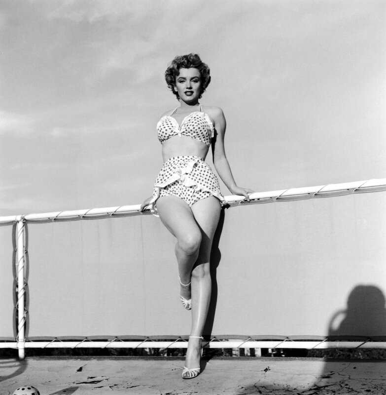 Woman in Polka-dot Swimsuit — Black, Confident, Afternoon