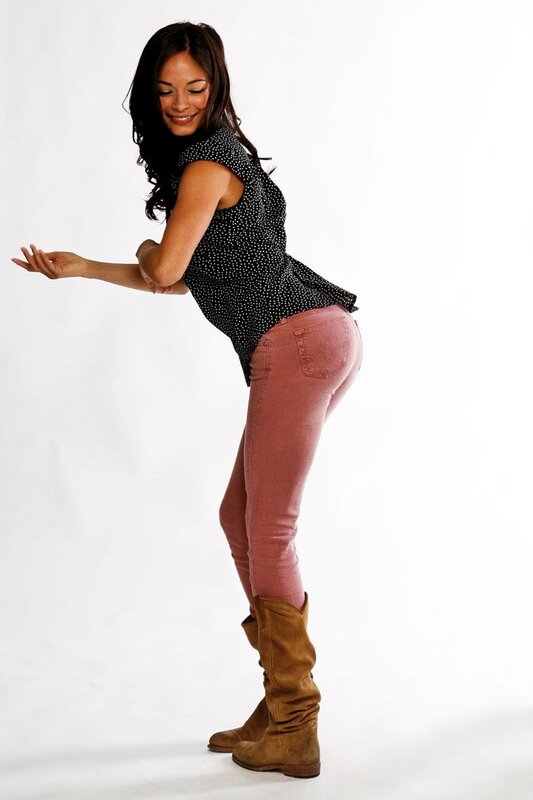 woman in polka dot top and boots