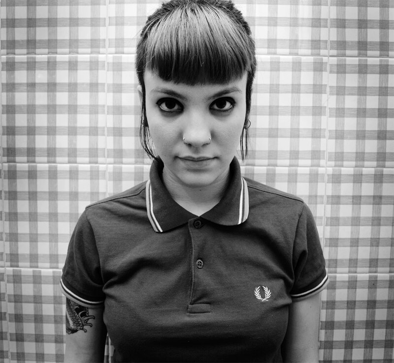 woman in polo shirt