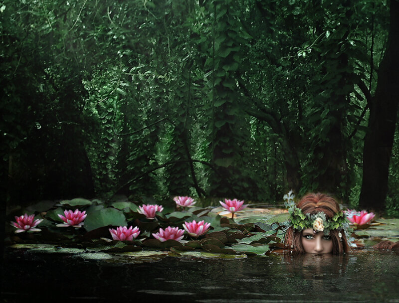 Woman in Pond with Flowers