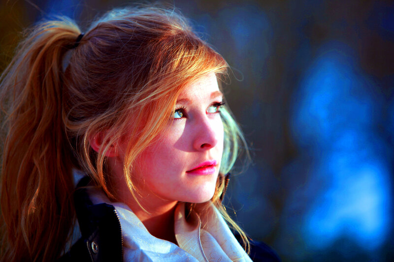 woman in ponytail looking away