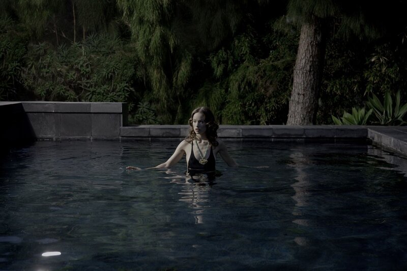 woman in pool at night