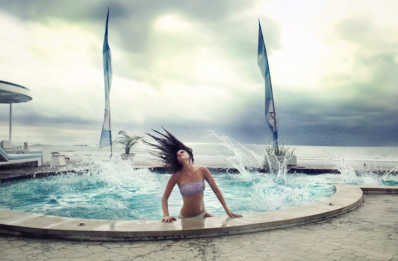 Woman in Pool — Blue, Dramatic, Afternoon, Photograph