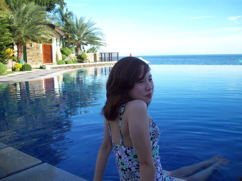 Woman in Pool — Blue, Serene, Afternoon, Photograph, Ocean
