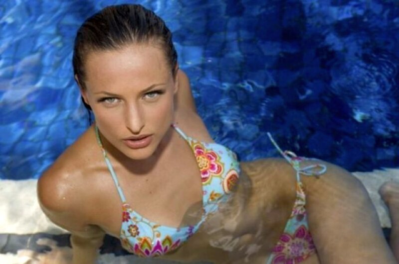 woman in pool wearing bikini