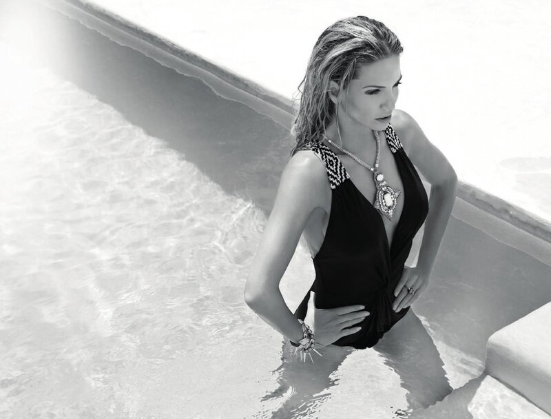 woman in pool wearing swimsuit