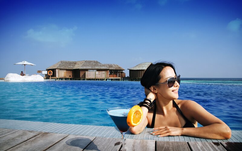 Woman in Pool with Cocktail — Blue