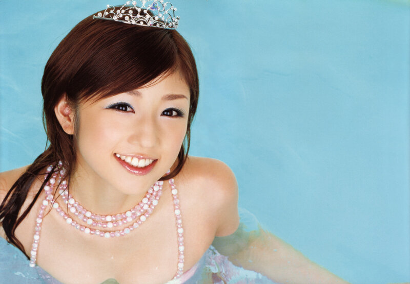woman in pool with crown