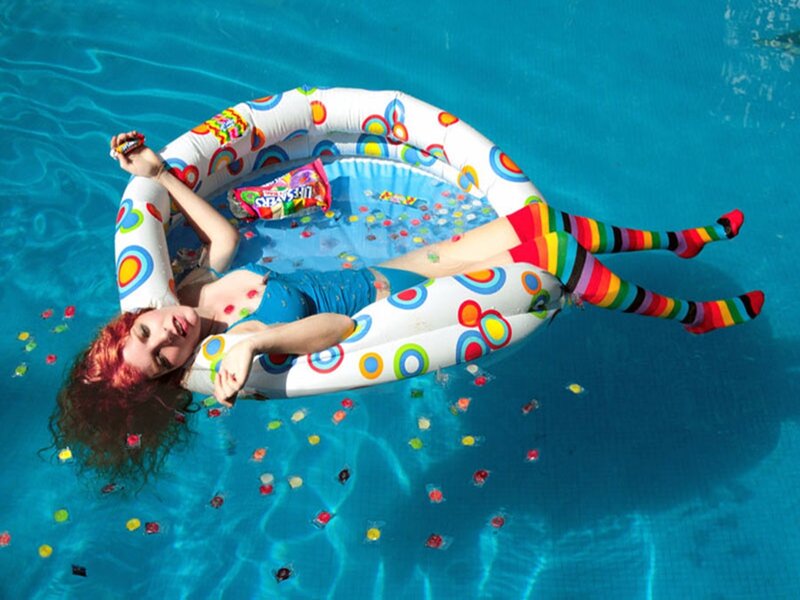 Woman in Pool with Float — Blue
