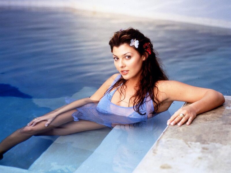 woman in pool with flowers