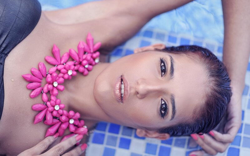Woman in Pool with Necklace — Pink
