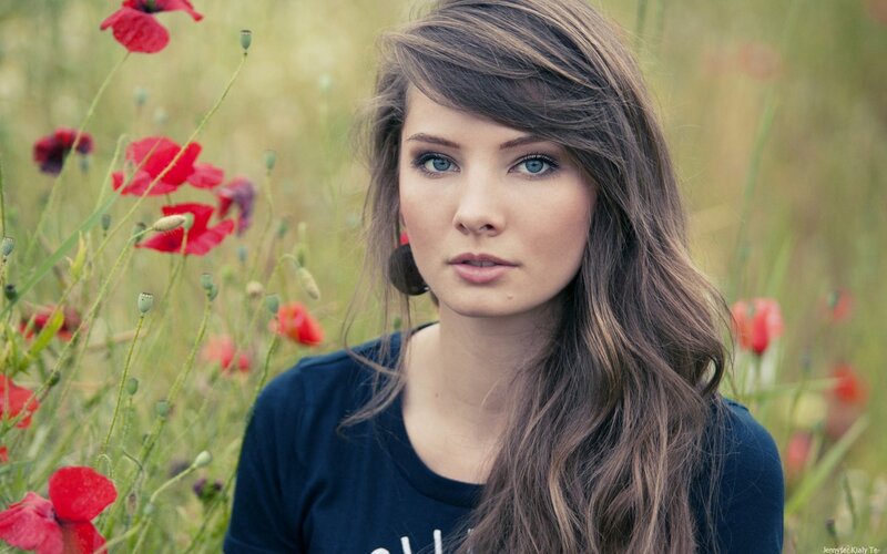 woman in poppy field