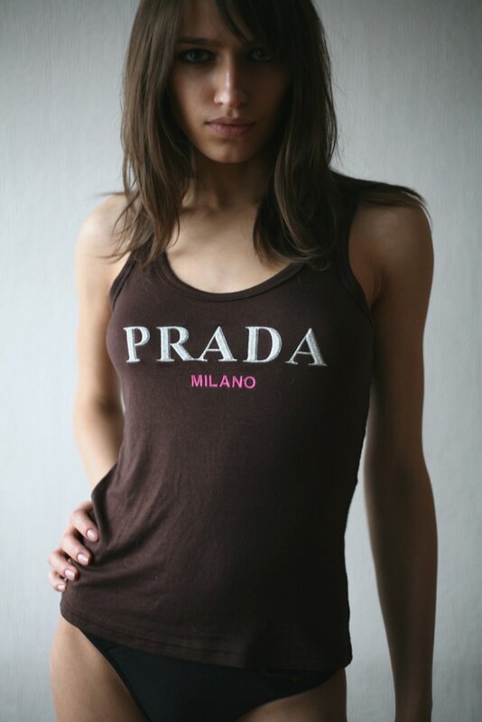 Woman in Prada tank top