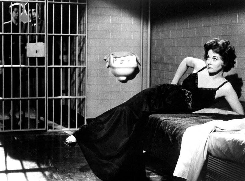 Woman in Prison Cell — Black