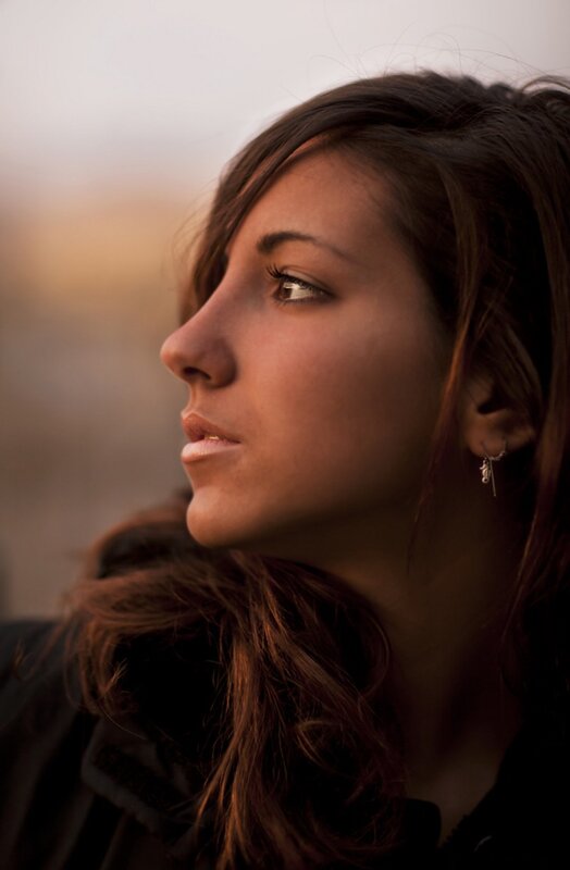woman in profile at sunset