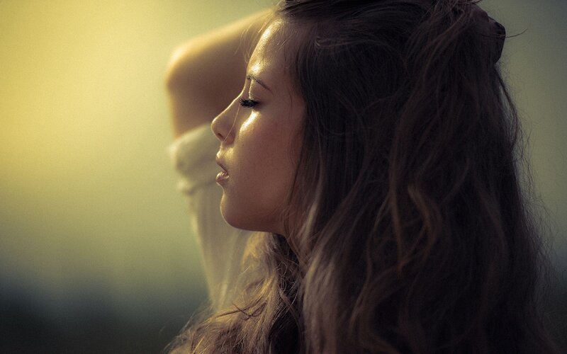 woman in profile at sunset