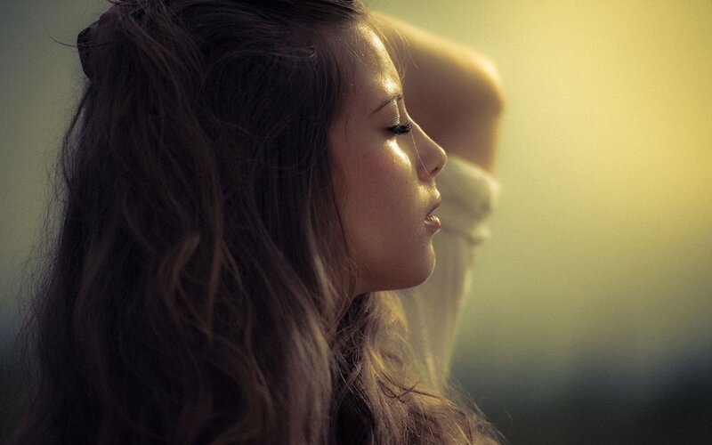 woman in profile at sunset