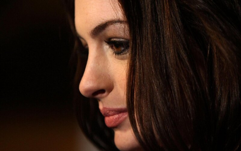 Woman in Profile — Brown, Serious, Photograph