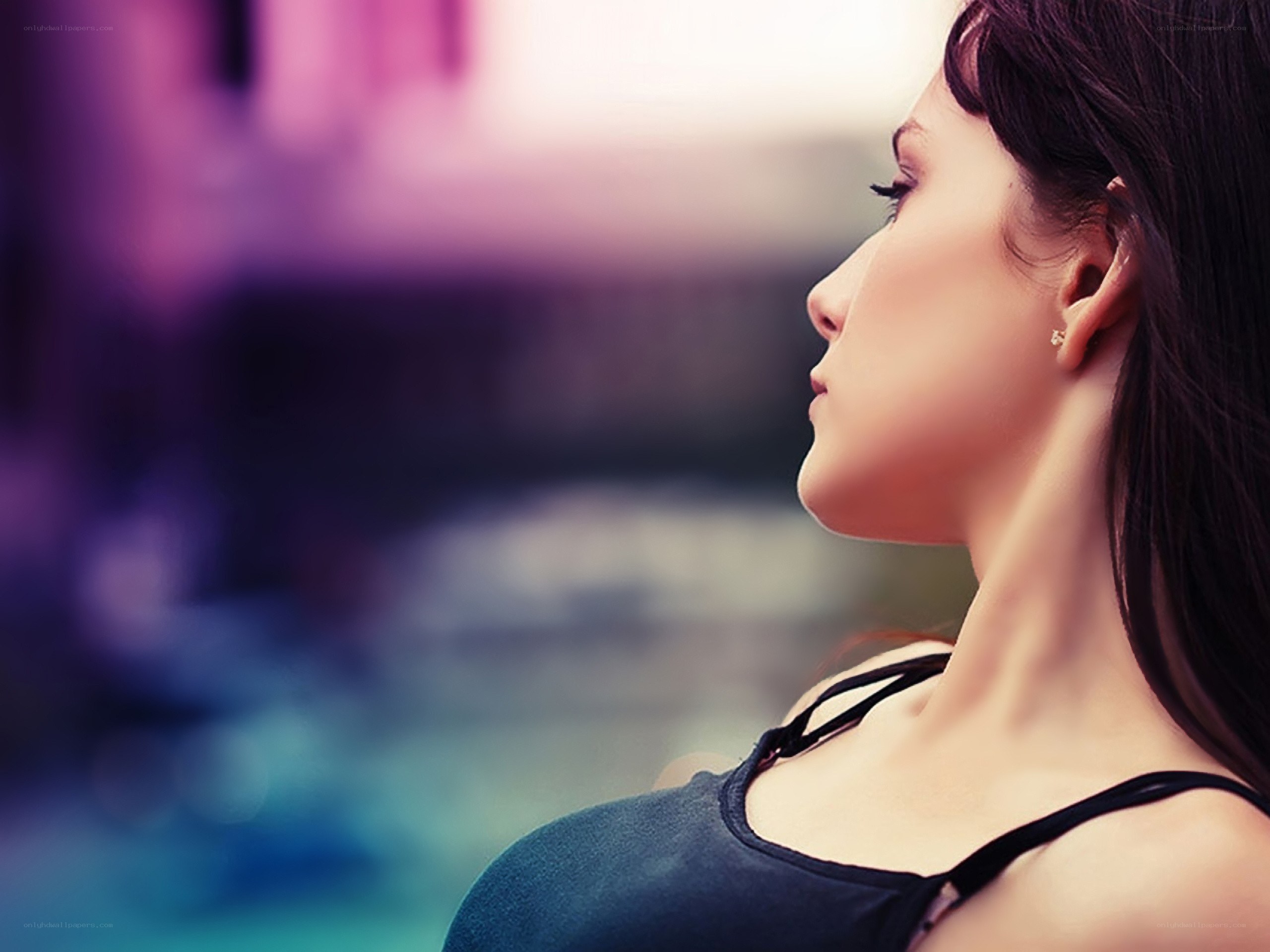 woman in profile by pool