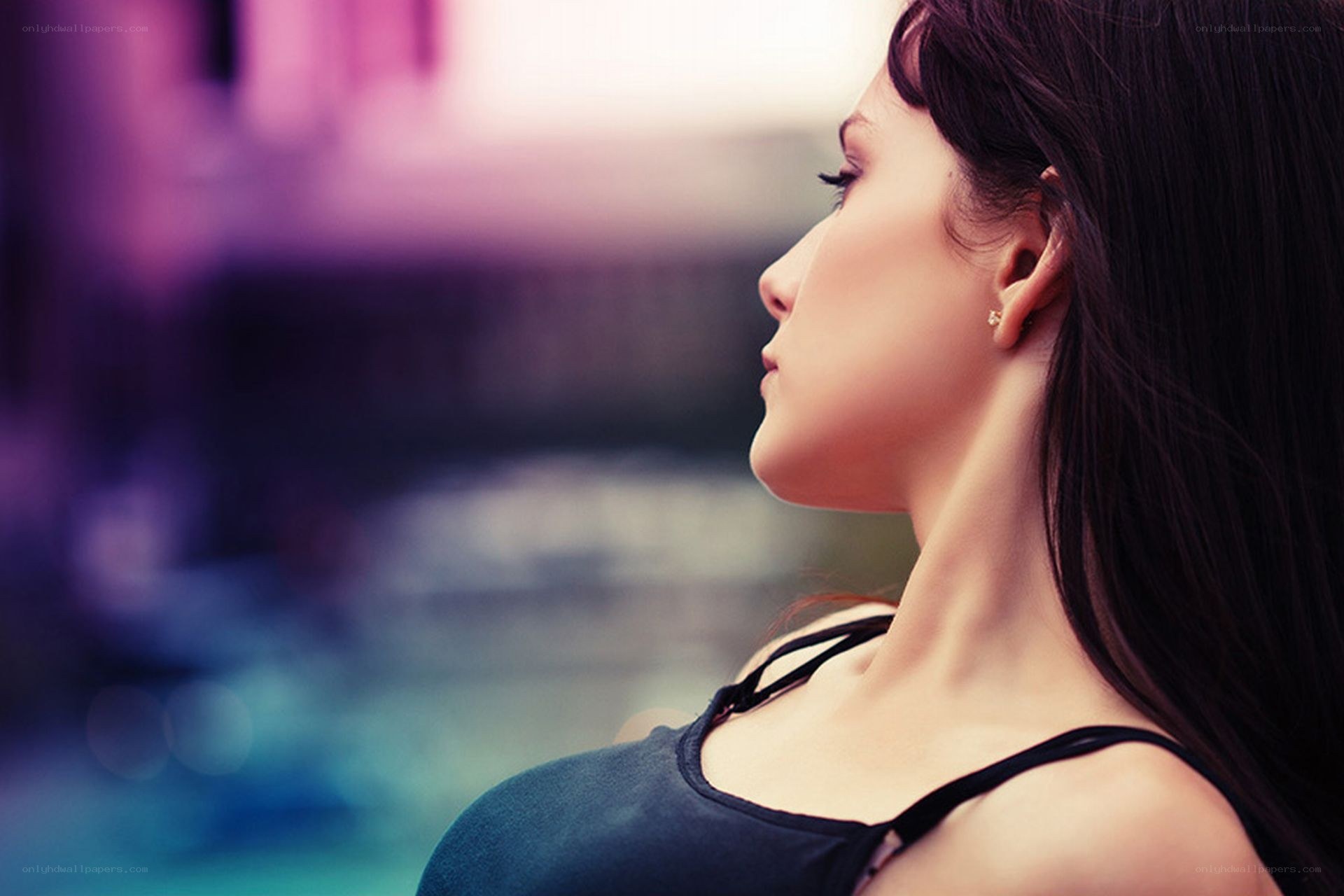 woman in profile by pool