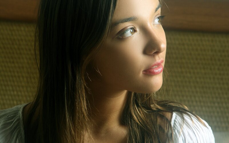 woman in profile looking away