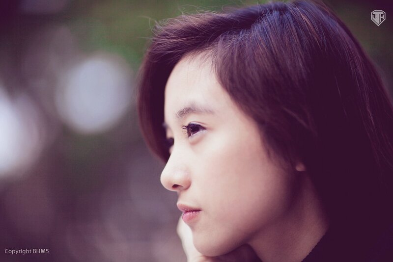 woman in profile looking away