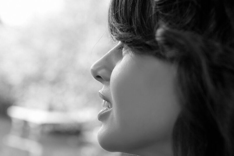 woman in profile looking up