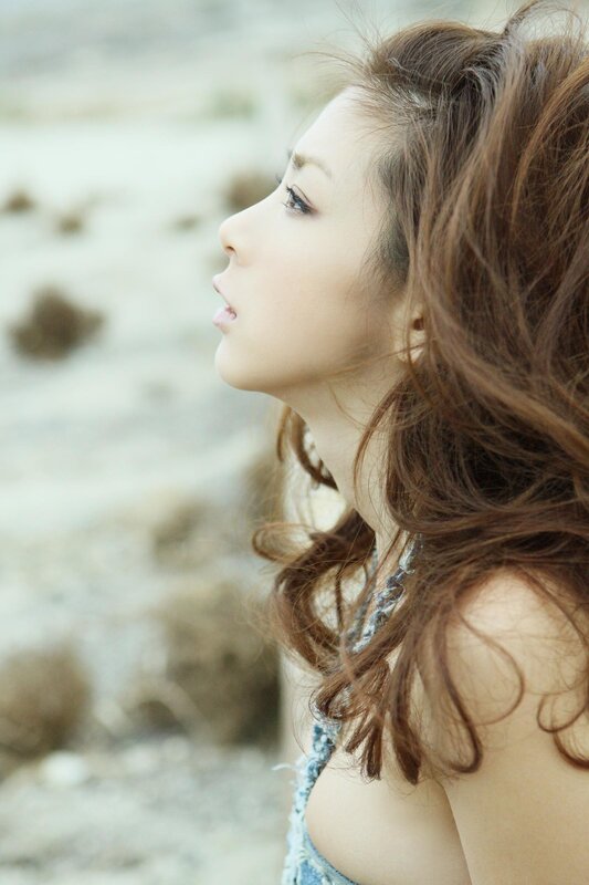 woman in profile on beach