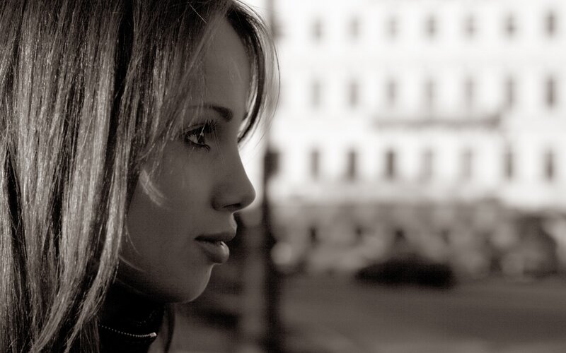 woman in profile on street